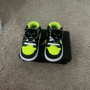 Vibrant Neon Green and Black Jordan 1 low